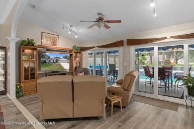 Welcome to this totally updated POOL HOME. SOLAR HEATED POOL on Timber Pines Golf Course in Florida - for sale on GolfHomes.com, golf home, golf lot