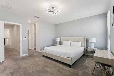 Step into the ultimate Florida lifestyle with this stunning on The Oasis Club at Champions Gate in Florida - for sale on GolfHomes.com, golf home, golf lot