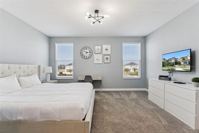 Step into the ultimate Florida lifestyle with this stunning on The Oasis Club at Champions Gate in Florida - for sale on GolfHomes.com, golf home, golf lot