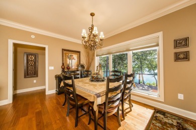 Experience the pinnacle of lakefront luxury in this furnished on  in Arkansas - for sale on GolfHomes.com, golf home, golf lot