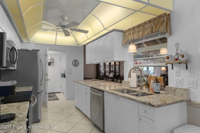 Welcome to this totally updated POOL HOME. SOLAR HEATED POOL on Timber Pines Golf Course in Florida - for sale on GolfHomes.com, golf home, golf lot