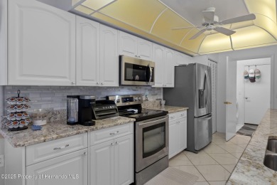 Welcome to this totally updated POOL HOME. SOLAR HEATED POOL on Timber Pines Golf Course in Florida - for sale on GolfHomes.com, golf home, golf lot