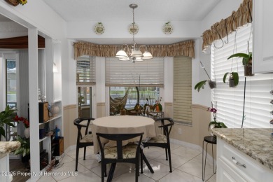 Welcome to this totally updated POOL HOME. SOLAR HEATED POOL on Timber Pines Golf Course in Florida - for sale on GolfHomes.com, golf home, golf lot