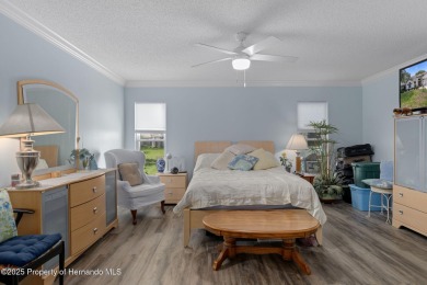 Welcome to this totally updated POOL HOME. SOLAR HEATED POOL on Timber Pines Golf Course in Florida - for sale on GolfHomes.com, golf home, golf lot