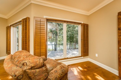 Experience the pinnacle of lakefront luxury in this furnished on  in Arkansas - for sale on GolfHomes.com, golf home, golf lot