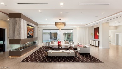 Within triple gated Promontory Pointe, and behind its own on Red Rock Country Club in Nevada - for sale on GolfHomes.com, golf home, golf lot