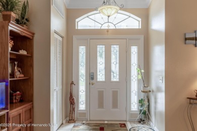 Welcome to this totally updated POOL HOME. SOLAR HEATED POOL on Timber Pines Golf Course in Florida - for sale on GolfHomes.com, golf home, golf lot