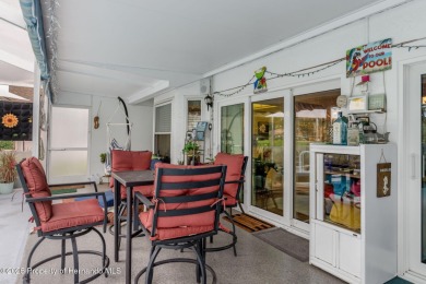 Welcome to this totally updated POOL HOME. SOLAR HEATED POOL on Timber Pines Golf Course in Florida - for sale on GolfHomes.com, golf home, golf lot