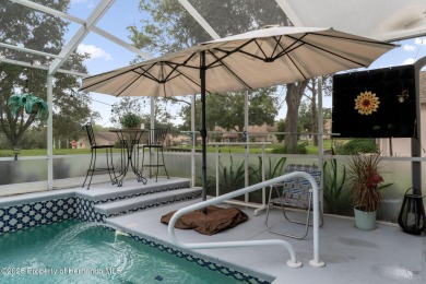 Welcome to this totally updated POOL HOME. SOLAR HEATED POOL on Timber Pines Golf Course in Florida - for sale on GolfHomes.com, golf home, golf lot