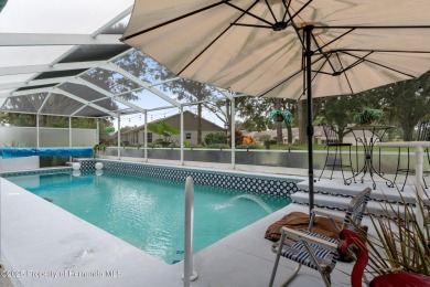 Welcome to this totally updated POOL HOME. SOLAR HEATED POOL on Timber Pines Golf Course in Florida - for sale on GolfHomes.com, golf home, golf lot