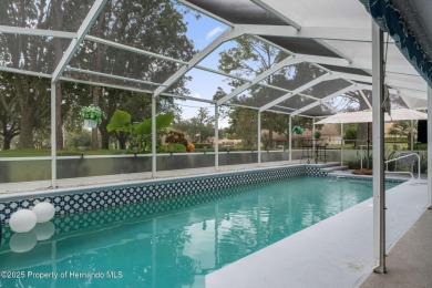 Welcome to this totally updated POOL HOME. SOLAR HEATED POOL on Timber Pines Golf Course in Florida - for sale on GolfHomes.com, golf home, golf lot