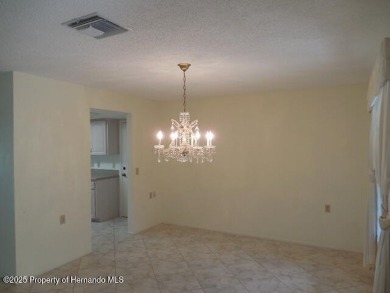 Looking for that big 2 bedroom home in a prestigious gated on Timber Pines Golf Course in Florida - for sale on GolfHomes.com, golf home, golf lot
