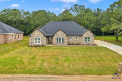 Welcome to your dream home in the sought-after Southern Hills on Southern Hills Golf Club in Georgia - for sale on GolfHomes.com, golf home, golf lot