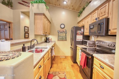 Escape to this charming 2-bedroom, 2-bath cabin nestled in the on Torreon Golf Club in Arizona - for sale on GolfHomes.com, golf home, golf lot
