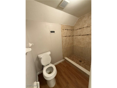This duplex 2 bedrooms and 2 bathrooms each unit is ideally on San Carlos Golf Club in Florida - for sale on GolfHomes.com, golf home, golf lot