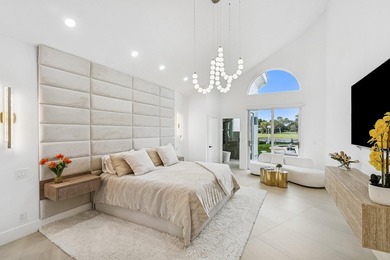 A striking, newly renovated two-story residence showcasing on  in Florida - for sale on GolfHomes.com, golf home, golf lot