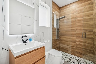 A striking, newly renovated two-story residence showcasing on  in Florida - for sale on GolfHomes.com, golf home, golf lot