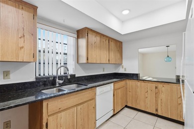 Welcome to this charming 2-bedroom, 2-bath home in the highly on Feather Sound Country Club in Florida - for sale on GolfHomes.com, golf home, golf lot