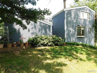 Enjoy golf course living in this spacious 2-story end-unit condo on Lake Forest Golf and Country Club in Missouri - for sale on GolfHomes.com, golf home, golf lot