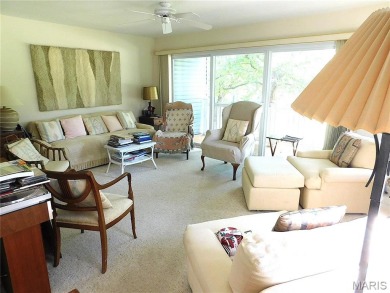 Enjoy golf course living in this spacious 2-story end-unit condo on Lake Forest Golf and Country Club in Missouri - for sale on GolfHomes.com, golf home, golf lot