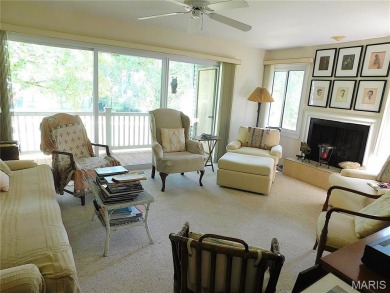 Enjoy golf course living in this spacious 2-story end-unit condo on Lake Forest Golf and Country Club in Missouri - for sale on GolfHomes.com, golf home, golf lot