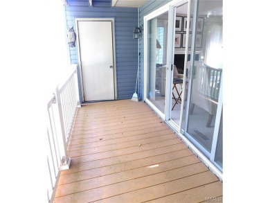 Enjoy golf course living in this spacious 2-story end-unit condo on Lake Forest Golf and Country Club in Missouri - for sale on GolfHomes.com, golf home, golf lot