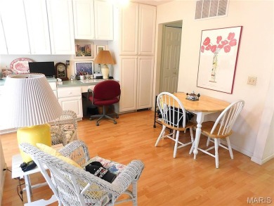 Enjoy golf course living in this spacious 2-story end-unit condo on Lake Forest Golf and Country Club in Missouri - for sale on GolfHomes.com, golf home, golf lot
