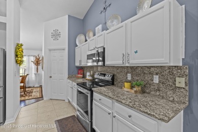 Step into refined Florida living with this beautifully upgraded on Spring Hill Golf Course in Florida - for sale on GolfHomes.com, golf home, golf lot