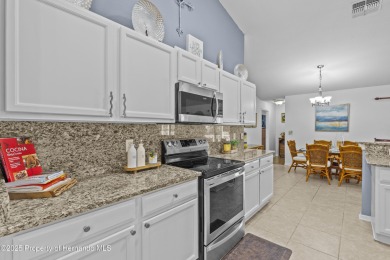 Step into refined Florida living with this beautifully upgraded on Spring Hill Golf Course in Florida - for sale on GolfHomes.com, golf home, golf lot