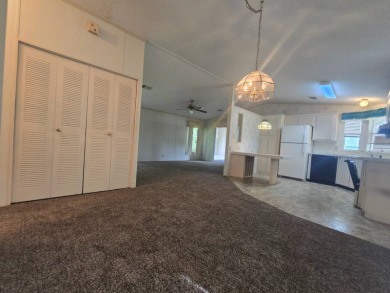 Live the Florida Dream in Rolling Greens Village -  Premier 55+ on Rolling Greens Executive Golf Community in Florida - for sale on GolfHomes.com, golf home, golf lot