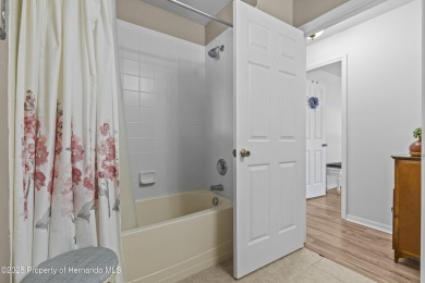 Step into refined Florida living with this beautifully upgraded on Spring Hill Golf Course in Florida - for sale on GolfHomes.com, golf home, golf lot