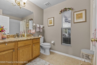 Step into refined Florida living with this beautifully upgraded on Spring Hill Golf Course in Florida - for sale on GolfHomes.com, golf home, golf lot