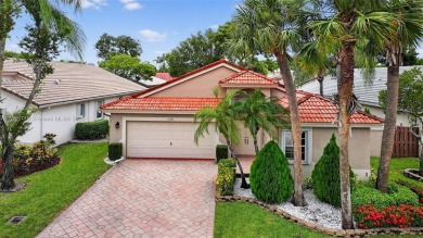 Updated 3BDRM/3BA Courtyard model home in the much sought after on Westchester Golf and Country Club in Florida - for sale on GolfHomes.com, golf home, golf lot