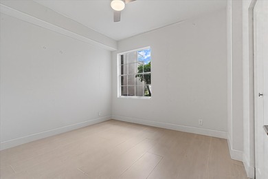 This light-filled first-floor condo has been completely on Polo Club of Boca Raton in Florida - for sale on GolfHomes.com, golf home, golf lot