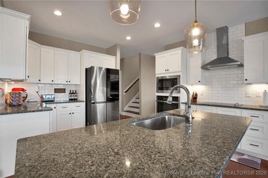 Located in the prestigious Gates Four Gated Golf Community, this on Gates Four Golf and Country Club in North Carolina - for sale on GolfHomes.com, golf home, golf lot