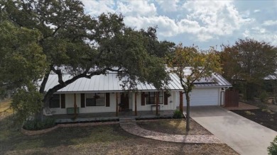 Beautiful farmhouse style home in the heart of Wimberley, TX on Quicksand At Woodcreek Golf Club in Texas - for sale on GolfHomes.com, golf home, golf lot