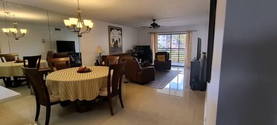 MUST SEE! Beautifully remodeled 1,250 sq ft 2nd floor 2/2 condo on Sunrise Lakes Phase IV Golf Course in Florida - for sale on GolfHomes.com, golf home, golf lot
