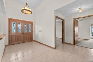 Welcome to Hearthstone on Forest Club, a timeless retreat where on Walden Lake Golf and Country Club  in Florida - for sale on GolfHomes.com, golf home, golf lot