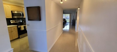 MUST SEE! Beautifully remodeled 1,250 sq ft 2nd floor 2/2 condo on Sunrise Lakes Phase IV Golf Course in Florida - for sale on GolfHomes.com, golf home, golf lot