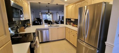 MUST SEE! Beautifully remodeled 1,250 sq ft 2nd floor 2/2 condo on Sunrise Lakes Phase IV Golf Course in Florida - for sale on GolfHomes.com, golf home, golf lot