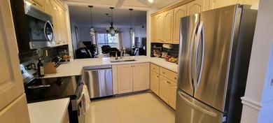 MUST SEE! Beautifully remodeled 1,250 sq ft 2nd floor 2/2 condo on Sunrise Lakes Phase IV Golf Course in Florida - for sale on GolfHomes.com, golf home, golf lot