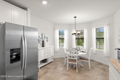 Welcome to this stunning 2022-built home in The Preserves at on Majors Golf Club At Bayside Lakes in Florida - for sale on GolfHomes.com, golf home, golf lot
