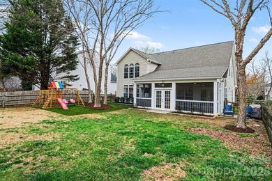 Set along the 4th tee of the golf course in the highly desirable on Highland Creek Golf Club in North Carolina - for sale on GolfHomes.com, golf home, golf lot