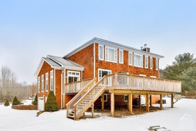 A warm abundance of natural light greets as you enter this on Windham Country Club in New York - for sale on GolfHomes.com, golf home, golf lot