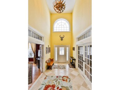 A warm abundance of natural light greets as you enter this on Windham Country Club in New York - for sale on GolfHomes.com, golf home, golf lot