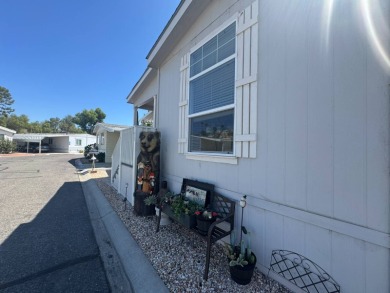 This 2021 model year "pre-owned" home that is on Hemet West Mobile Estates in California - for sale on GolfHomes.com, golf home, golf lot
