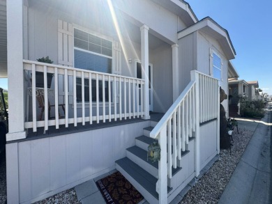 This 2021 model year "pre-owned" home that is on Hemet West Mobile Estates in California - for sale on GolfHomes.com, golf home, golf lot