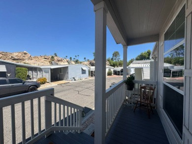 This 2021 model year "pre-owned" home that is on Hemet West Mobile Estates in California - for sale on GolfHomes.com, golf home, golf lot
