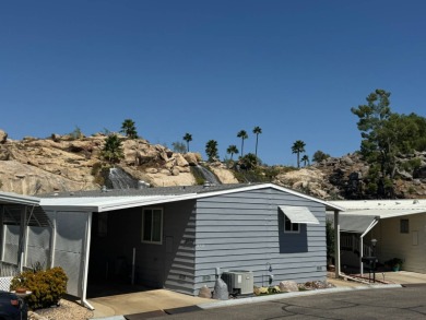 This 2021 model year "pre-owned" home that is on Hemet West Mobile Estates in California - for sale on GolfHomes.com, golf home, golf lot