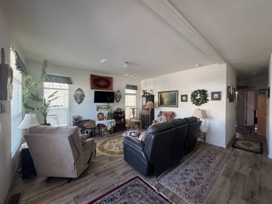 This 2021 model year "pre-owned" home that is on Hemet West Mobile Estates in California - for sale on GolfHomes.com, golf home, golf lot